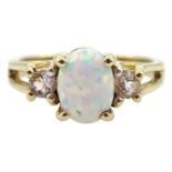 9ct gold three stone oval opal and white topaz ring