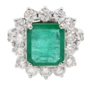 18ct white gold emerald and round brilliant cut diamond cluster ring