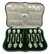 Set of twelve Kings pattern silver teaspoons and tongs in fitted case Sheffield 1912 Maker Mappin an