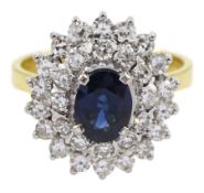 Gold oval sapphire and round brilliant cut diamond cluster ring