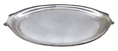 Dutch silver oval tray with bead edge decoration and scroll handles circa 1925 L46cm 32.4oz