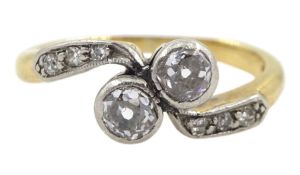 Early 20th century two stone old cut diamond crossover ring