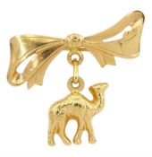 Gold bow bar brooch