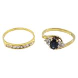 18ct gold channel set nine stone round brilliant cut diamond ring and a 9ct gold sapphire and diamon