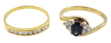 18ct gold channel set nine stone round brilliant cut diamond ring and a 9ct gold sapphire and diamon