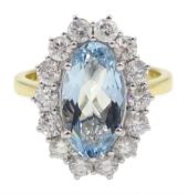 18ct gold oval aquamarine and diamond cluster ring