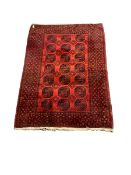 Afghanistan rug with red field and border 290cm x 205cm