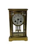 An early 20th century French Four Glass clock of small proportions c1910