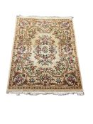 Chinese washed woollen embossed beige ground rug