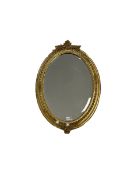 Oval gilt framed mirror by D.B Murray H66cm