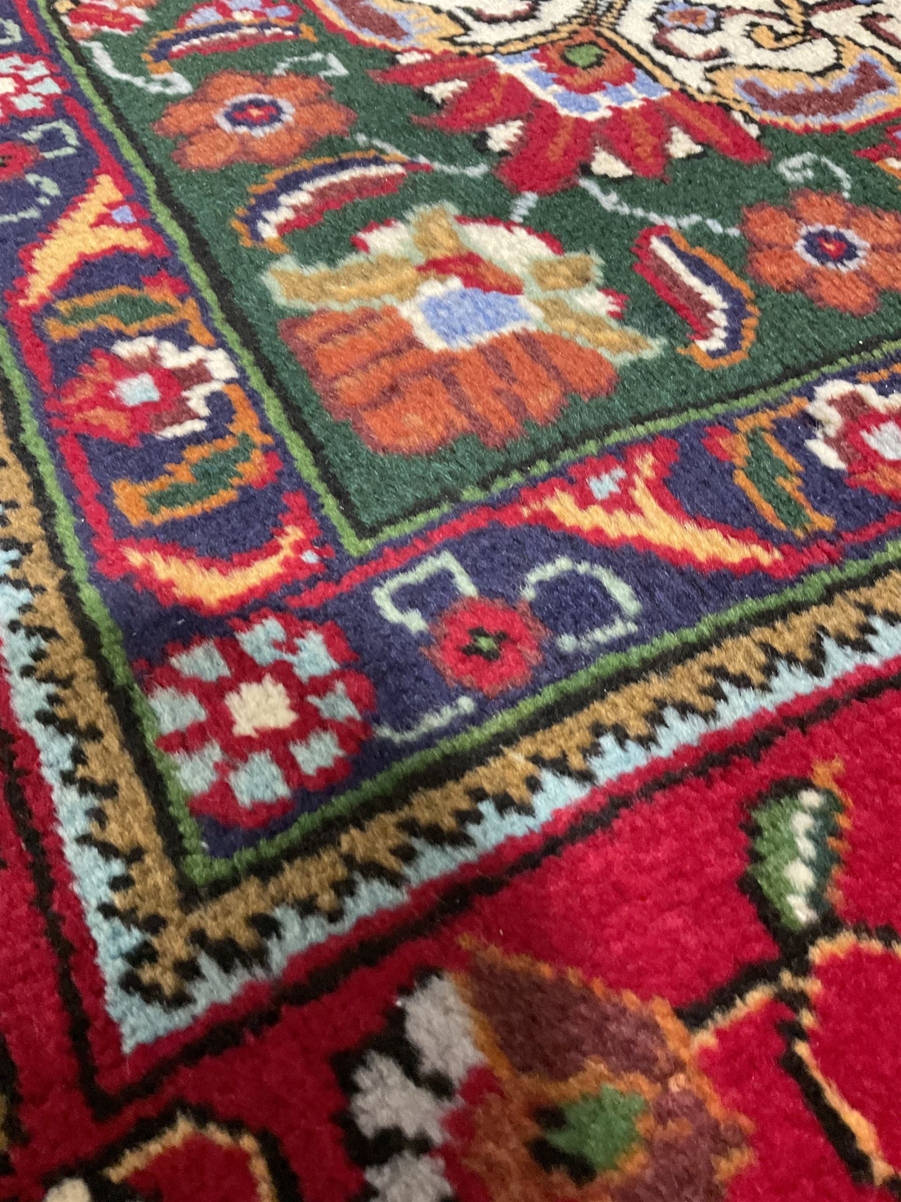 Hand knotted Persian rug from Tabriz region with red field - Image 2 of 3