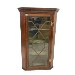 Georgian and later oak corner cabinet