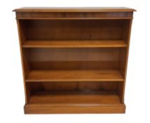 Figured yew open bookcase