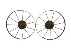 Pair of iron wheels by Blackstone & Co