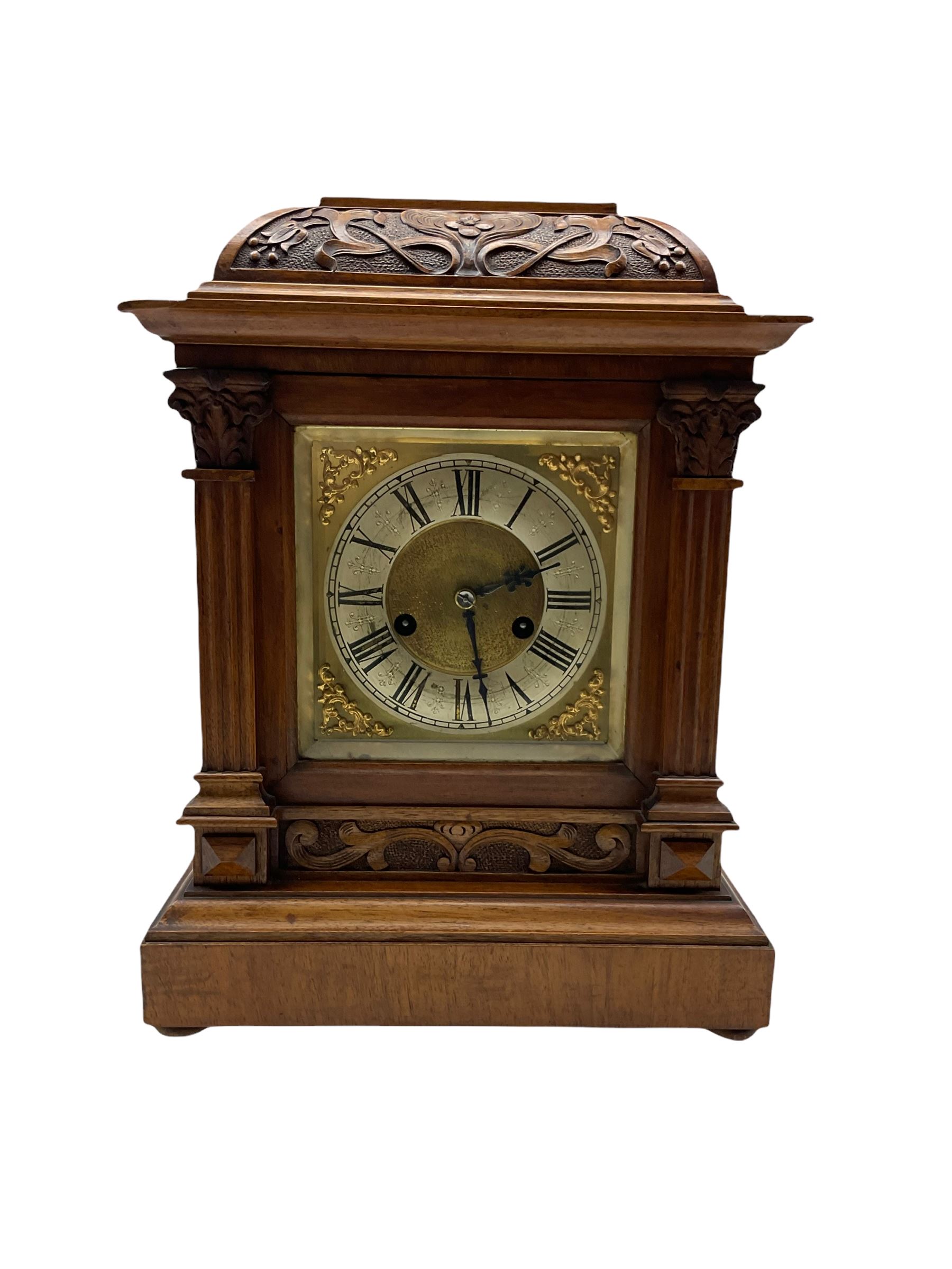 A German mantle clock in an oak case manufactured by HAC (Hamburg American Clock Company) c 1890