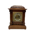 A German mantle clock in an oak case manufactured by HAC (Hamburg American Clock Company) c 1890