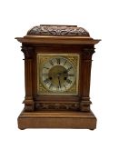 A German mantle clock in an oak case manufactured by HAC (Hamburg American Clock Company) c 1890