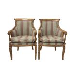 Pair of 20th century hardwood tub chairs upholstered in green and red fabric