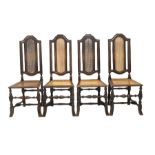 Set of four Victorian oak high back hall chairs of an earlier design