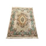 Chinese washed wool beige rug with all over foliate and floral design 272cm x 390cm