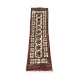 Persian Bokhara red ground runner rug 250cm x 66cm