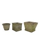 Set of three planters of different style and sizes