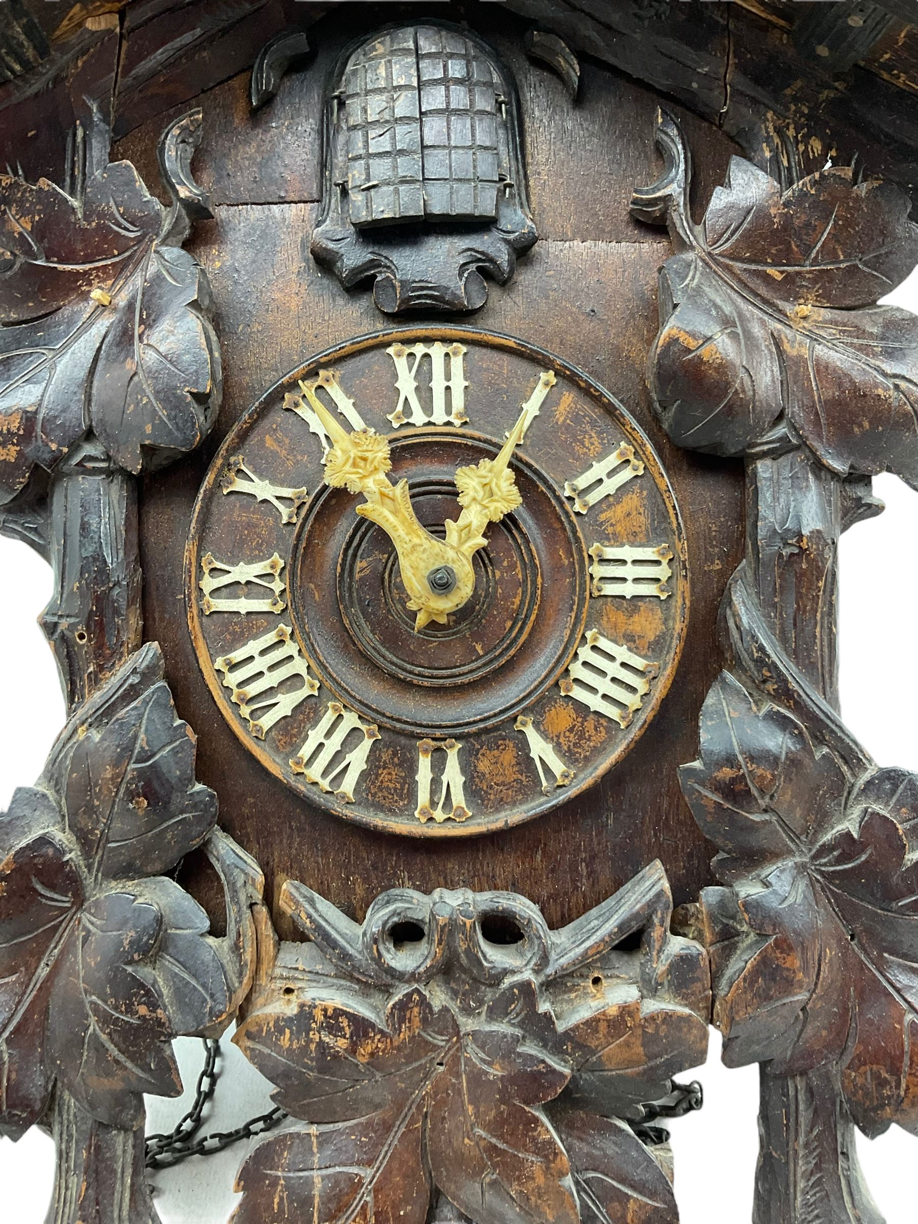 An early 19th century German Black Forest cuckoo clock in a carved oak case - Image 2 of 2