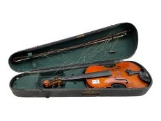 Vintage violin with bow in carrying case