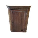 Oak corner cupboard with three fixed shelves