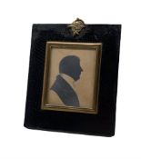 19th century head and shoulders silhouette portrait of a gentleman in ebonised frame 7cm x 6cm
