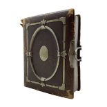 Leather photograph album and contents including military portrait by J Raucher