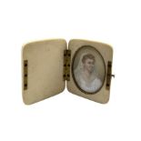 Early 20th century miniature oval head and shoulders portrait on ivory of a lady in her wedding dres