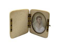 Early 20th century miniature oval head and shoulders portrait on ivory of a lady in her wedding dres