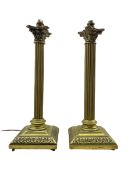 Pair of brass Corinthian column table lamps