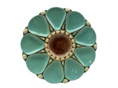 Victorian Minton majolica oyster plate with turquoise shell holders around a centre brown well