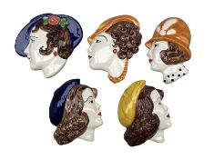 Set of five Moorland Chelsea pottery wall plaques in the style of 1920s ladies