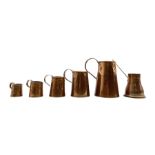 Set of five 19th century copper tankard measures comprising 1/2 Gallon