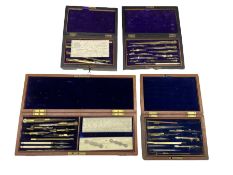 Cased set of drawing instruments by Elliott Bros. London inscribed J.S.Preston and three other cases