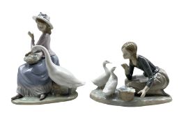 Two Lladro figures 'Food for the Ducks' model no. 4849 and 'Goose Trying to East' model no. 5034