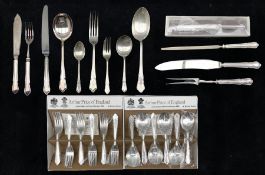 Collection of plated Dubarry pattern table cutlery including knives