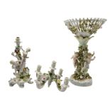 19th century Sitzendorf porcelain centrepiece modelled as three Cherubs against a floral encrusted t