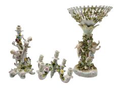 19th century Sitzendorf porcelain centrepiece modelled as three Cherubs against a floral encrusted t