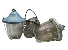 Two 20th century industrial bulkhead pendant ceiling hanging lights by Polam-Gdansk and another simi