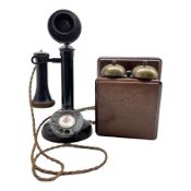 Early 20th century brass and Bakelite candlestick telephone marked no. 22 with wooden bell receiver