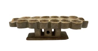 Tribal African 'Mancala' bead game upon pierced pedestal and rectangular stand