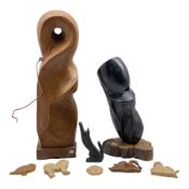 Various carvings by Ronald W. Southgate including 'The Cat' dated 98