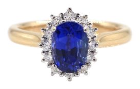 18ct rose gold oval sapphire and round brilliant cut diamond cluster ring