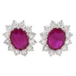 Pair of 18ct white gold oval ruby and round brilliant cut diamond stud earrings