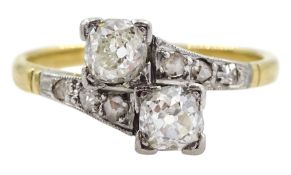 Early-mid 20th century 18ct gold two stone old cut diamond cross-over ring