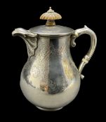Victorian silver hot milk jug of baluster form with engraved decoration